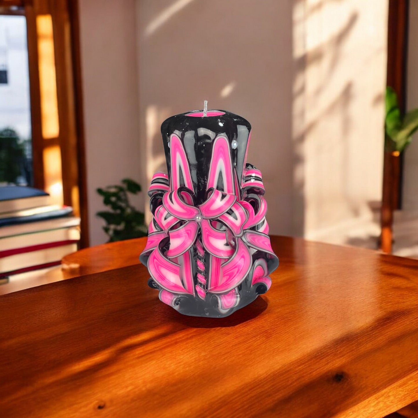 A black candle with pink and white floral patterns on its upper part, resembling a flower that opens under moonlight.
Used for romantic dinner, wedding, proposal, baptazing event.