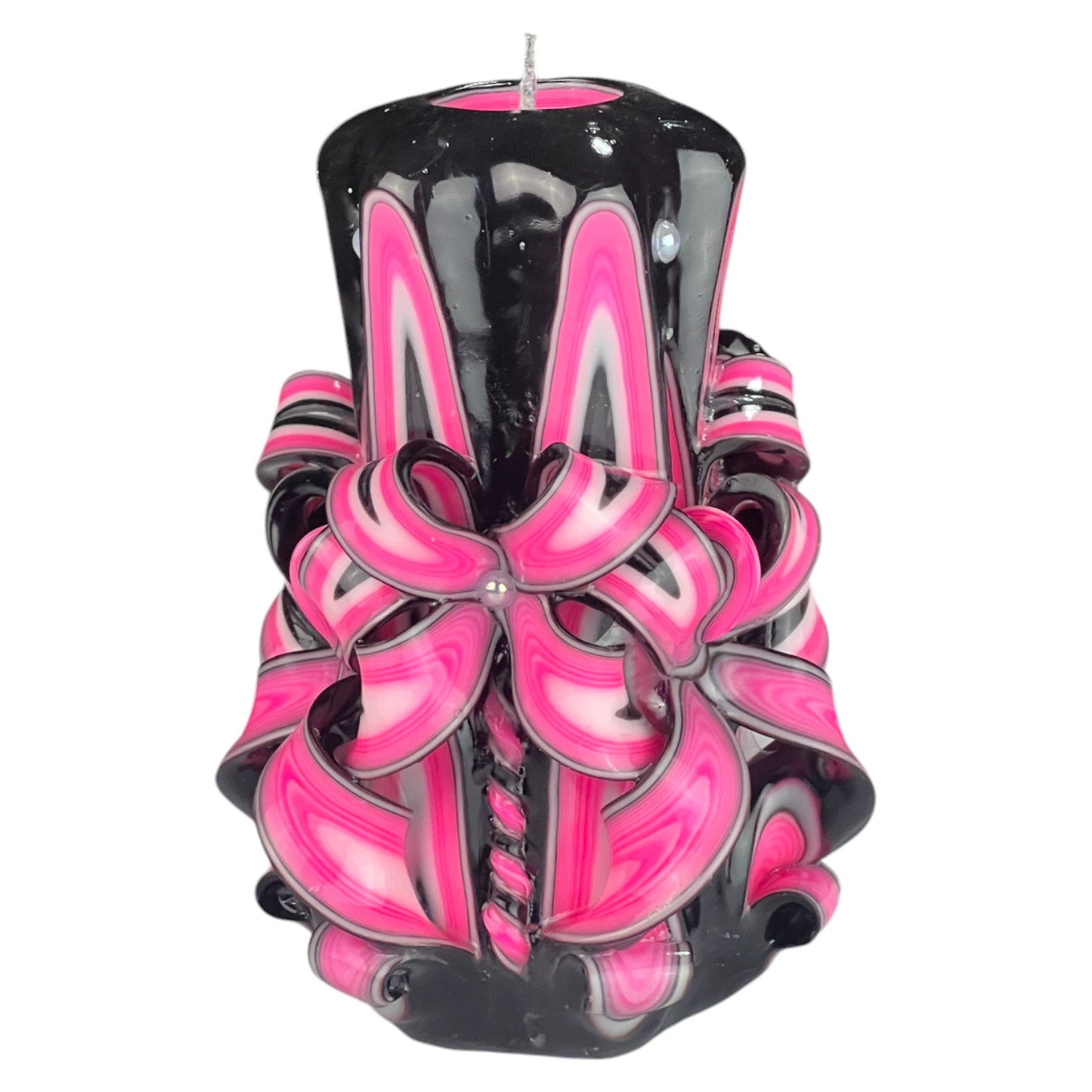 A black candle with pink and white floral patterns on its upper part, resembling a flower that opens under moonlight.
Used for romantic dinner, wedding, proposal, baptazing event.