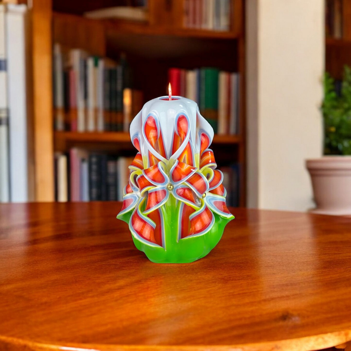 Spring Burst Candle 350g
A decorative candle with a green and white floral design, resembling a burst of flowers.
Used also for Easter holidays.