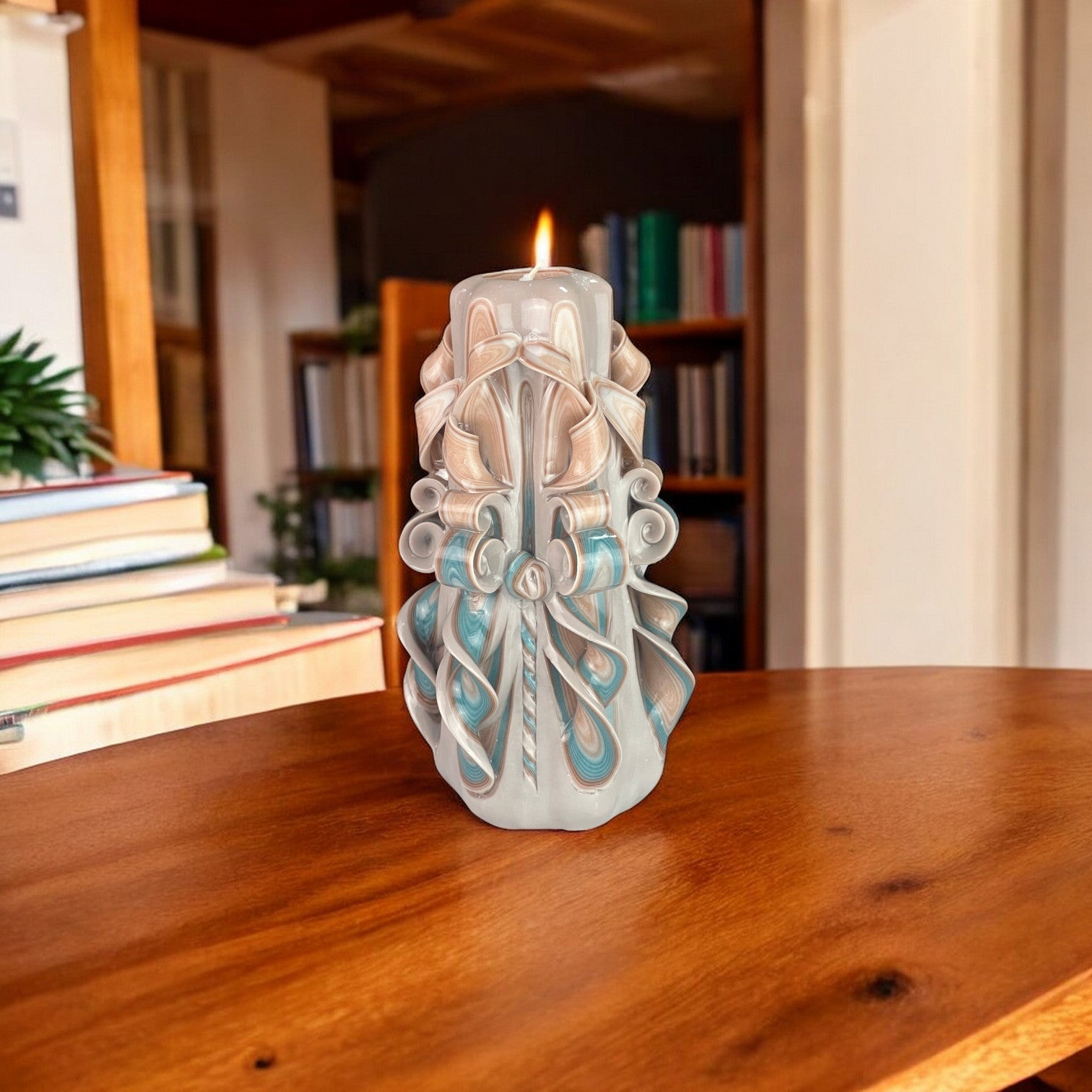 Seashell Candle 500g
A decorative seashell-shaped candle with cool blue and gray tones, featuring intricate floral and ocean-inspired designs.