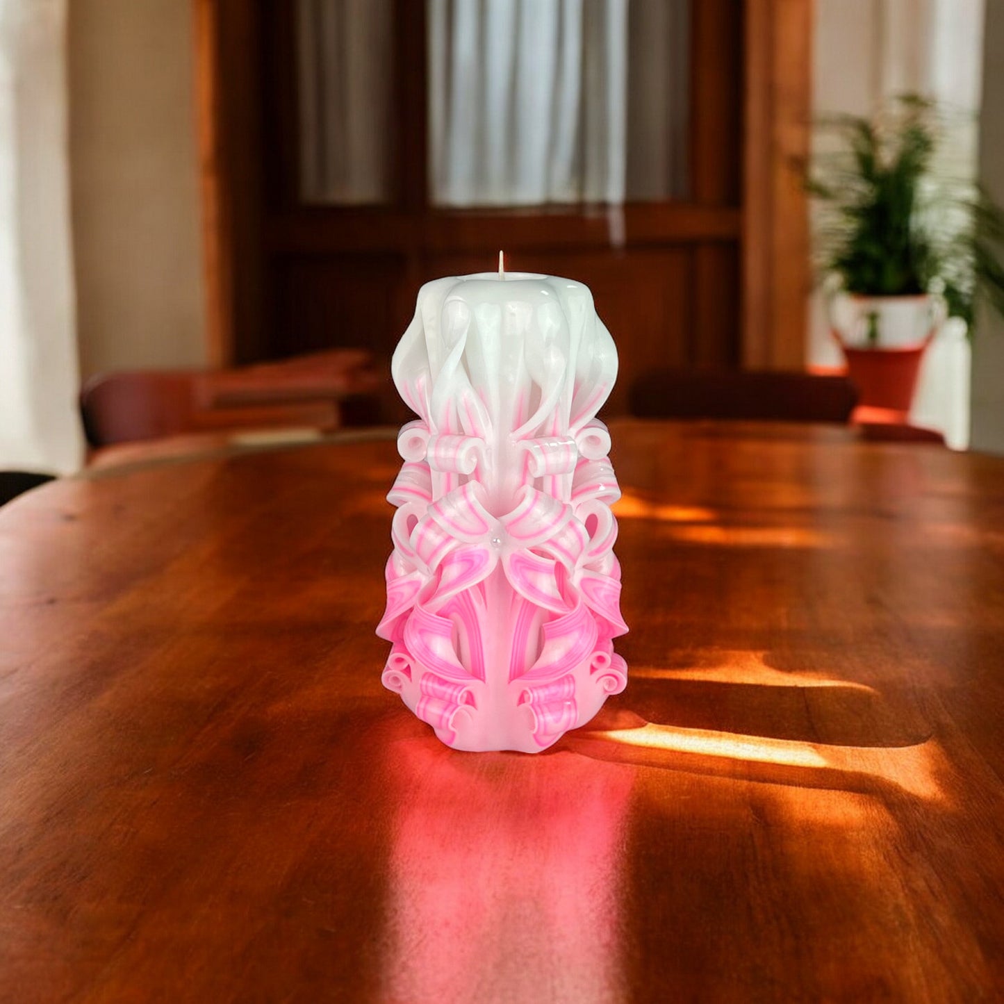 Misty Rose Candle 950g
A pink and white colored candle with a decorative top that resembles a rose.