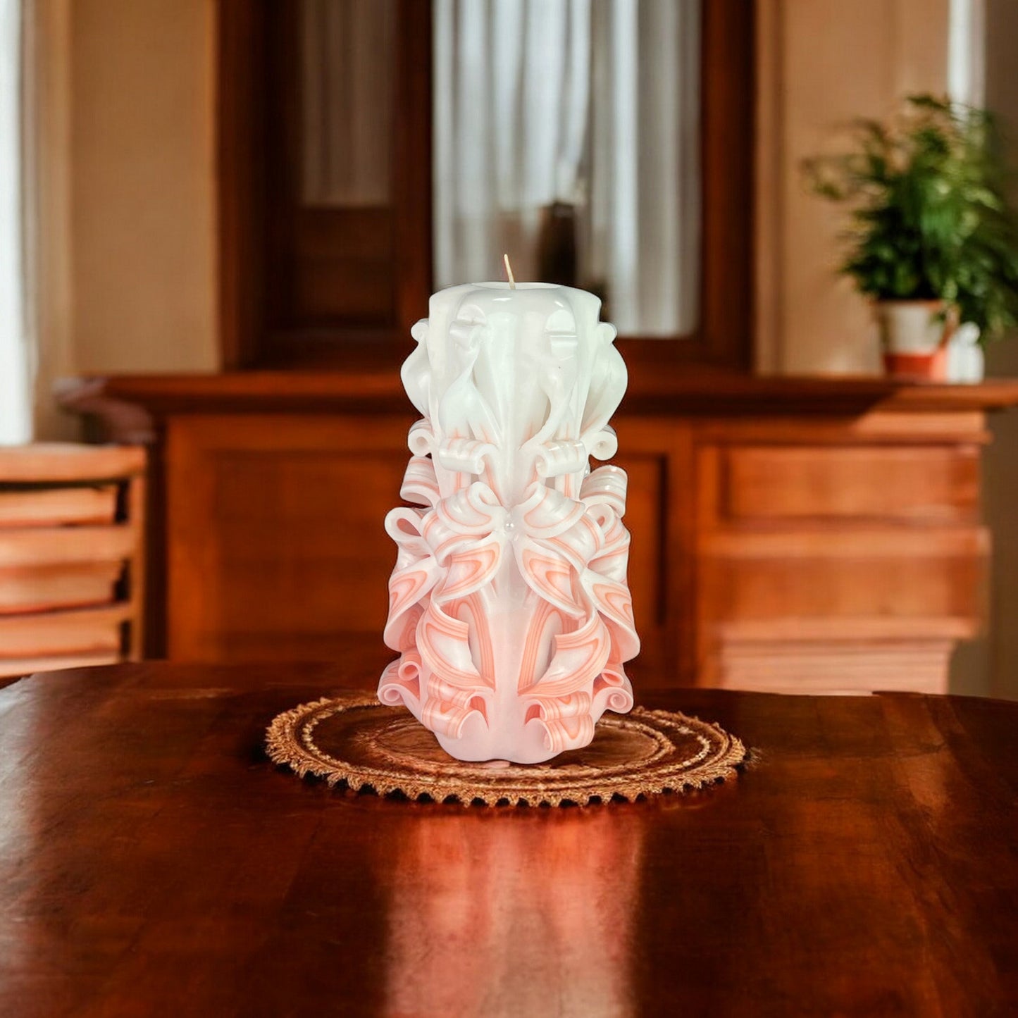 A pale pink, intricately carved candle with a textured surface.
Used for romantic dinner, wedding, proposal, baptazing event.