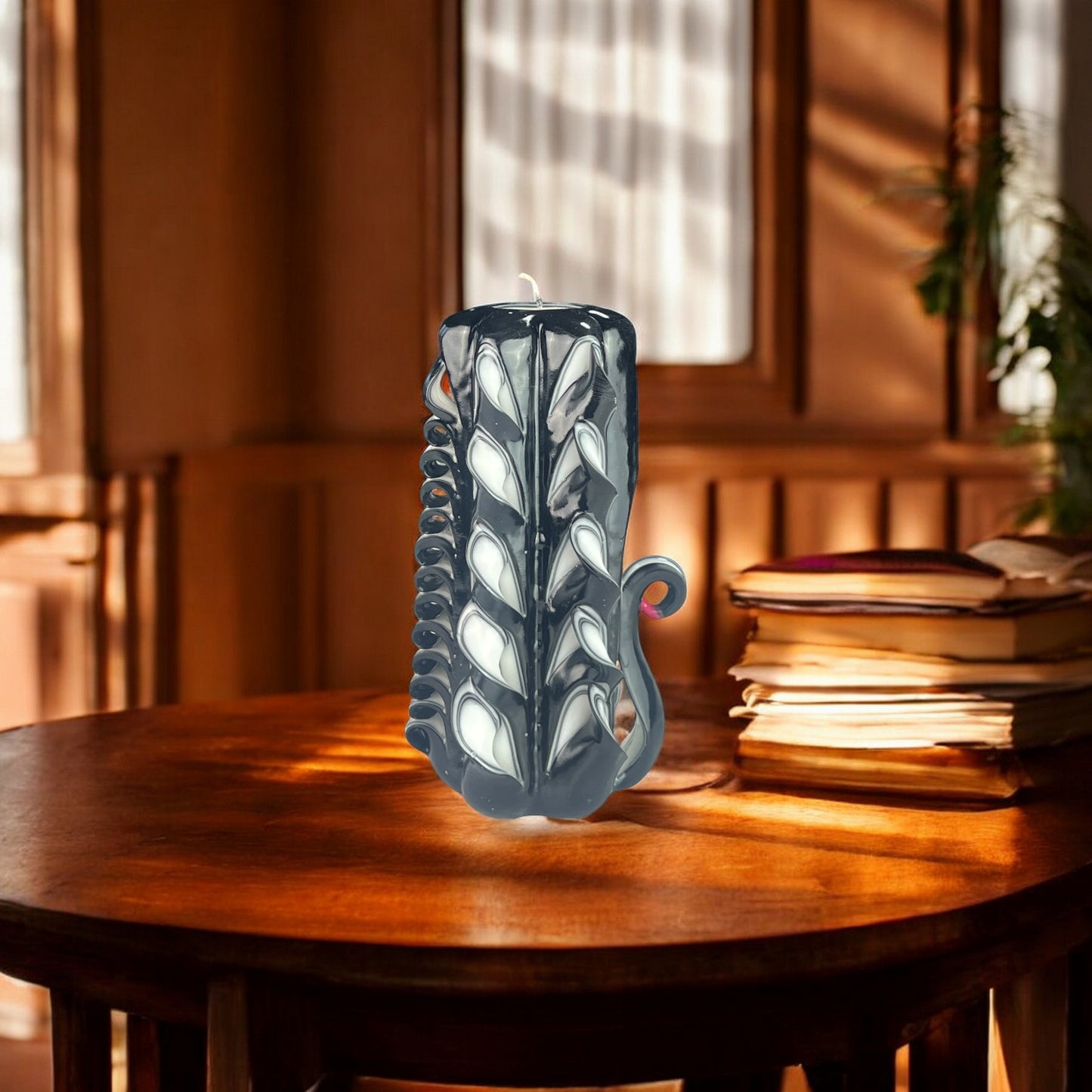 A black candle designed with a swan-like pattern, featuring intricate carvings and a curved handle.
Used for romantic dinner, wedding, proposal, baptazing event.